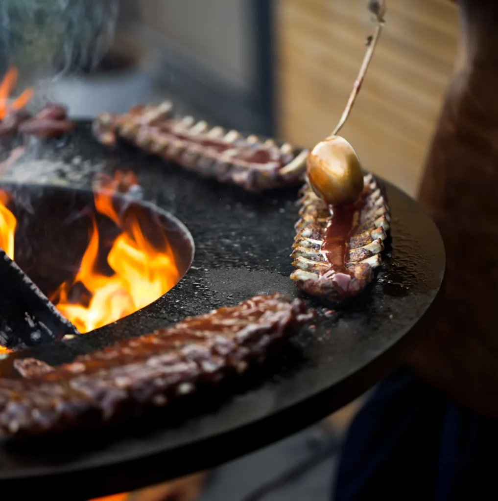 Grilled pork baby ribs with barbecue sauce